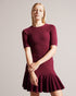 JOSAFEE-Dresses-When knitwear and glamour collide, you get JOSAFEE. This perfectly tailored mini dress boasts a figure hugging silhouette with a pleated hemline that ensures you'll look and feel fabulous in any setting, from a lunch date to a weekend exploring the city. Knitted mini dress Fit and flare silhouette Pleated hem Crew neck Half length sleeves Exposed zip fastening Ribbed waistband Jara is 5'10.5" / 1.79m and wears Dark Red in a Ted size 1 Feminine detailsA flirty pleated hem adds an interesting
